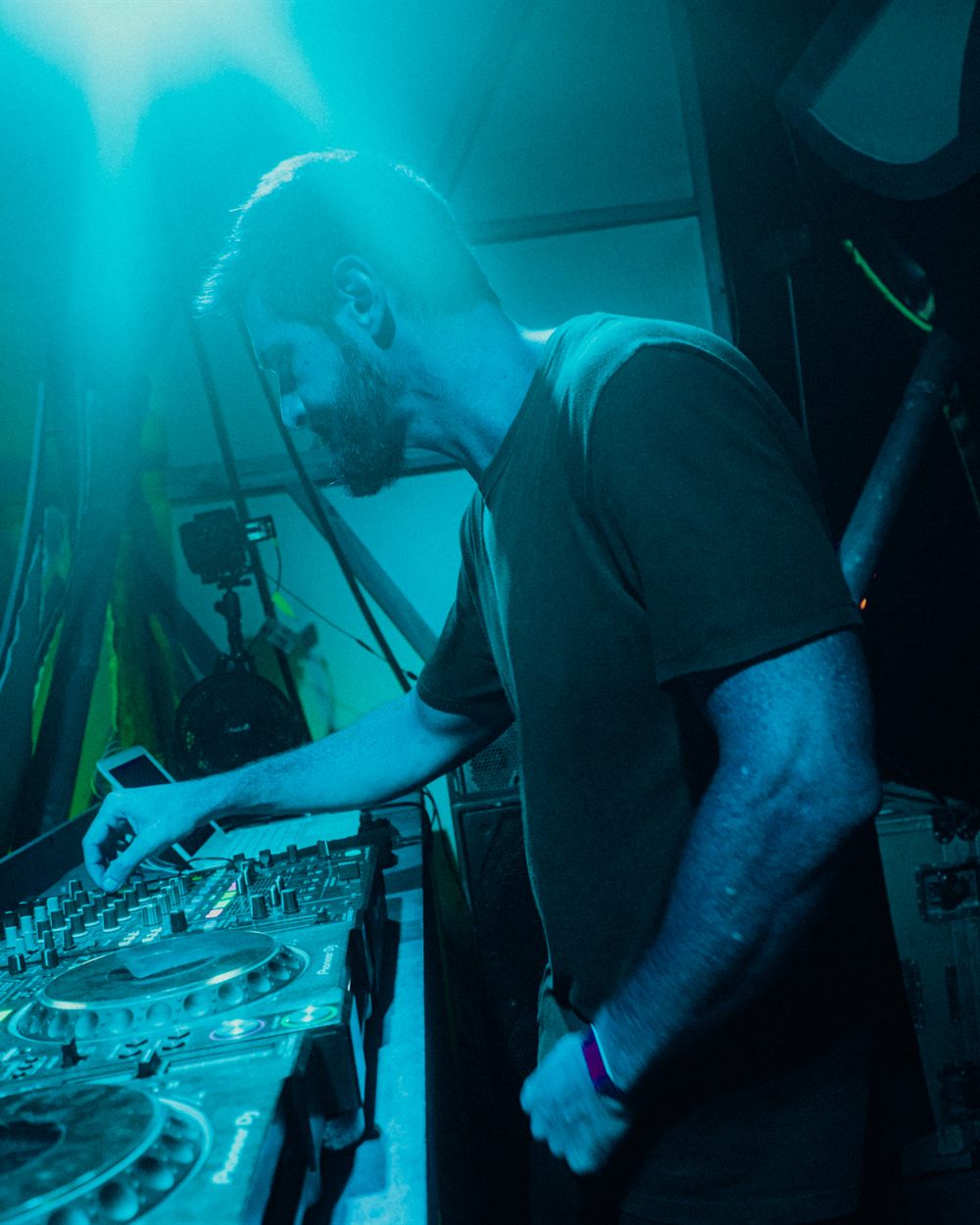 Orecch performing live, hands on the decks